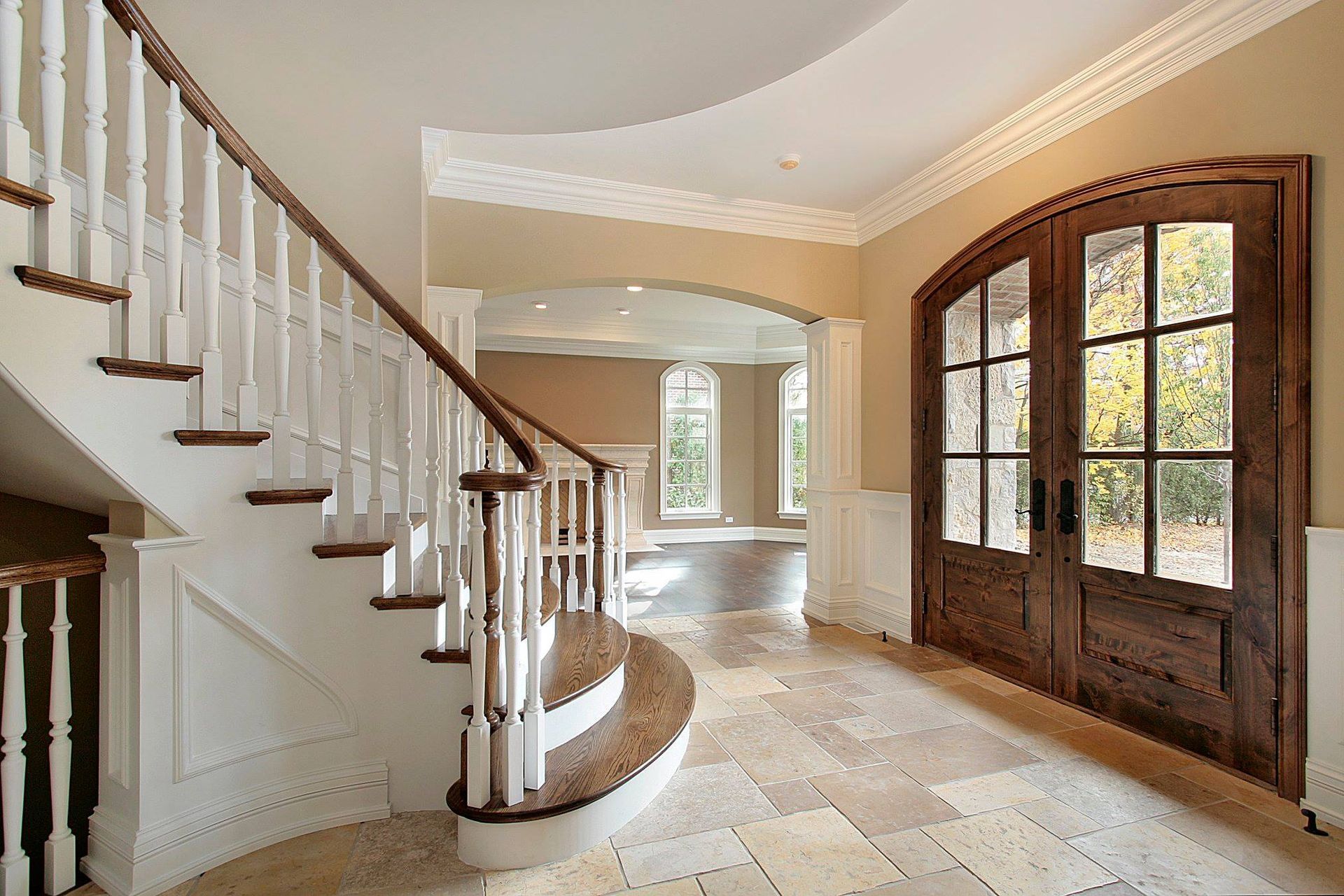 Painted walls and white staircase with wood banisters in Johnston, Iowa.