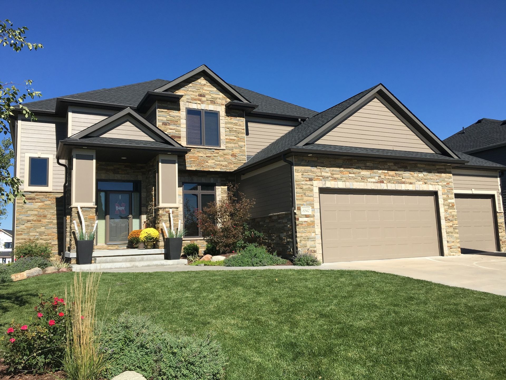 exterior painting project completed in Waukee Iowa by Harmony Painting
