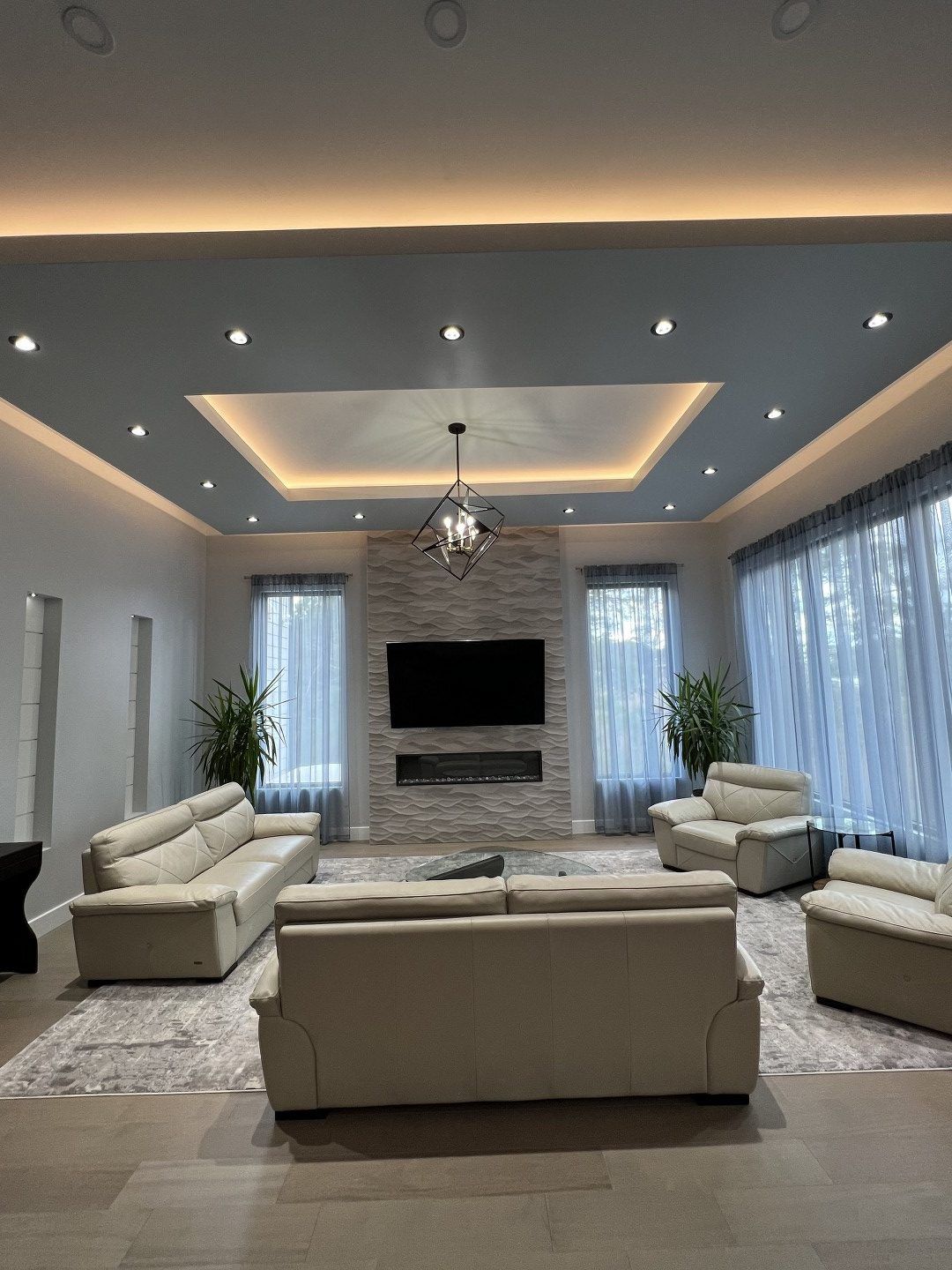 A living room filled with furniture and a flat screen tv