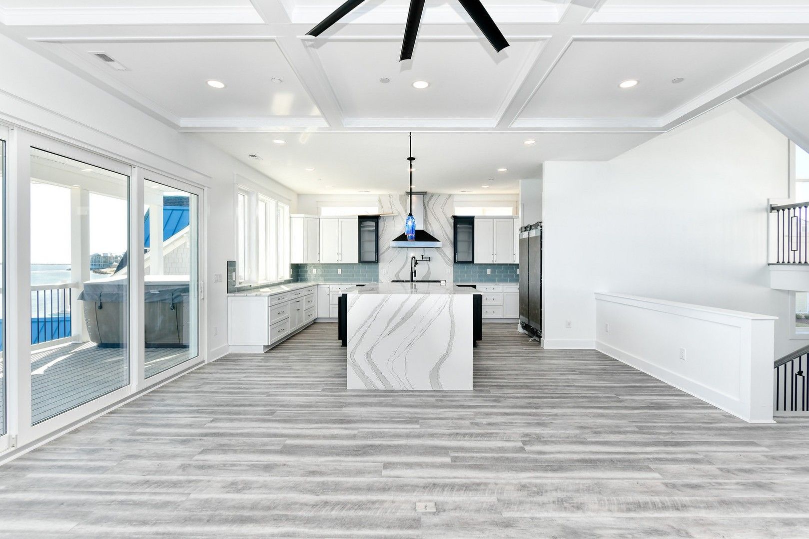 There is a large island in the middle of the kitchen.