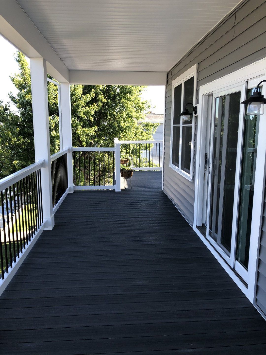 A bathroom with two sinks and a walk in shower.