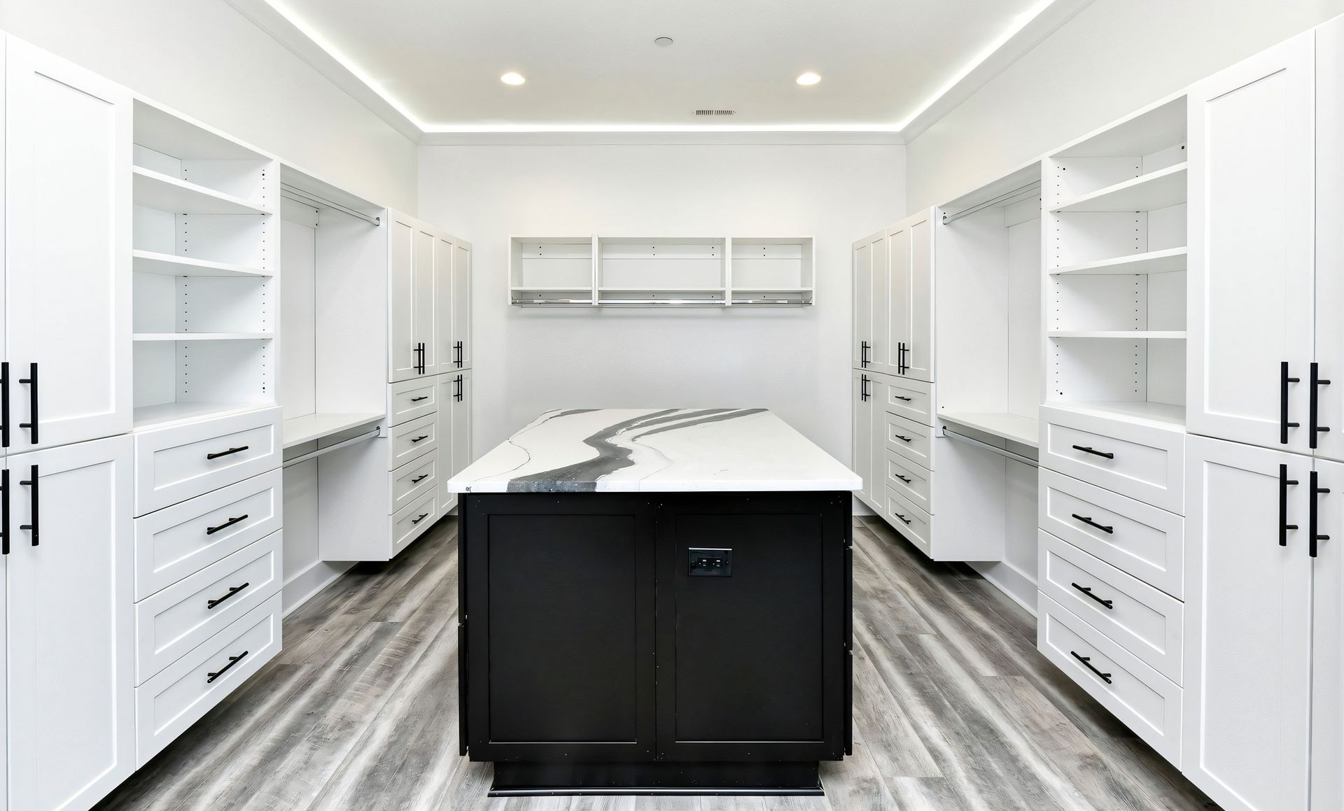 There is a large island in the middle of the room.