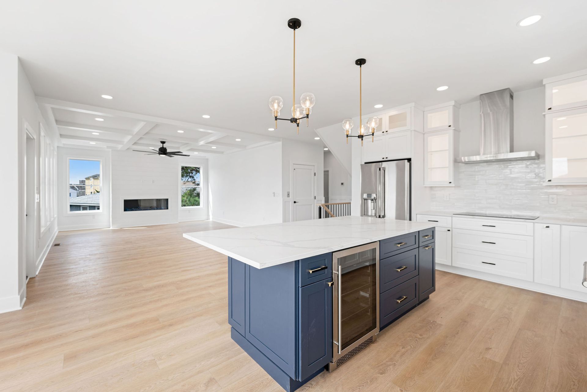 There is a large island in the middle of the kitchen.
