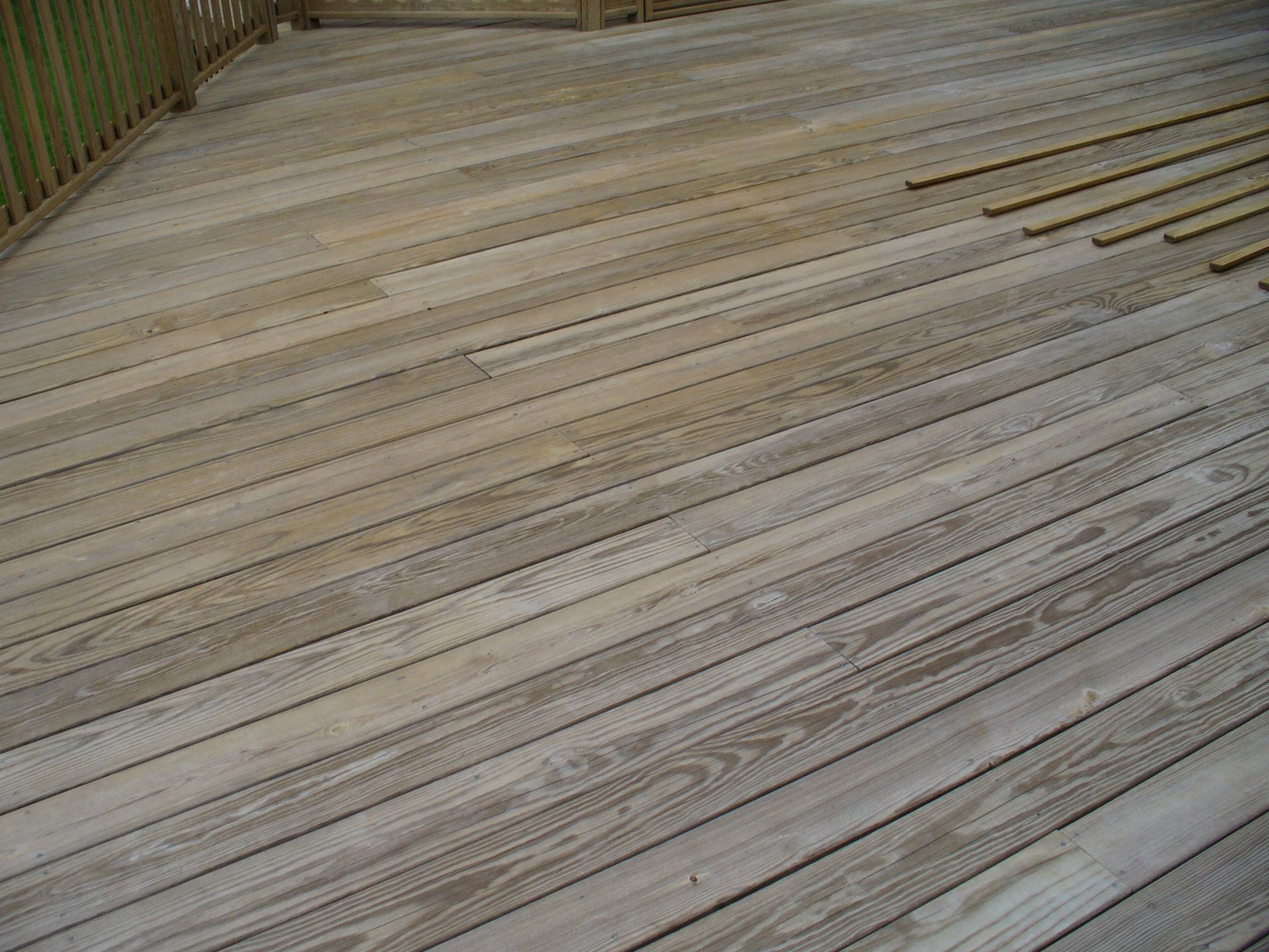 Deck cleaning and restoration services