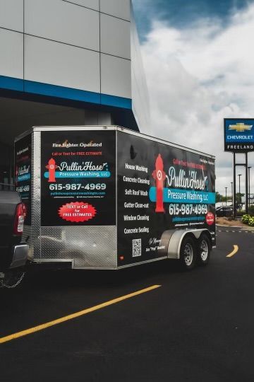 pullin hose service truck at work