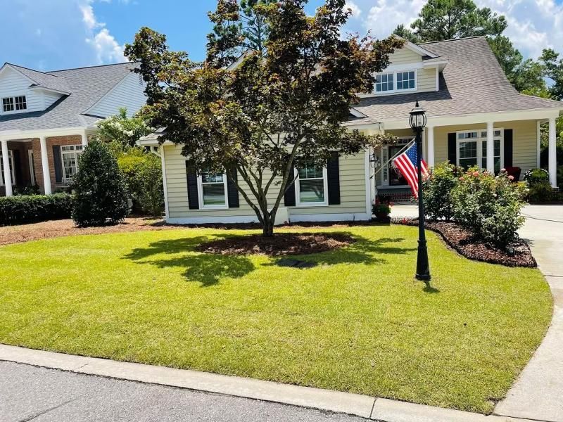 A house with a flag in front of it