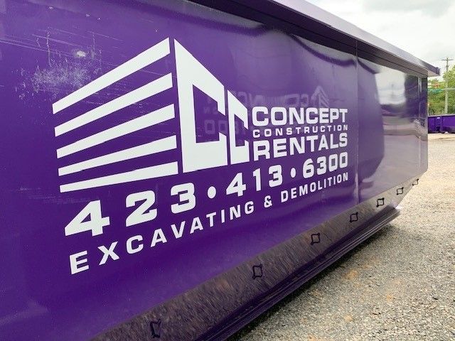 A purple dumpster for concept construction rentals excavating and demolition.
