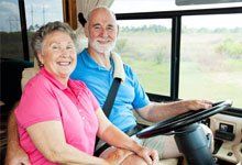Old couple inside a RV