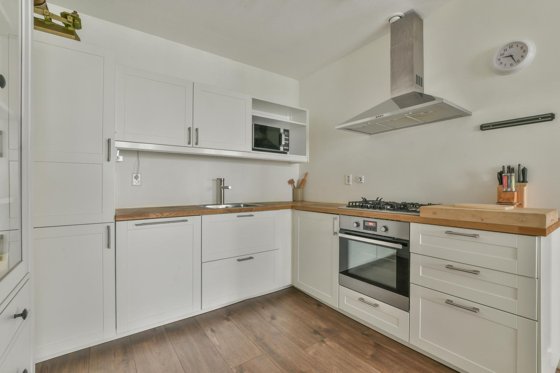 spacious-bright-kitchen-restores-after-cleaning-water-damaged-kitchen-cabinets