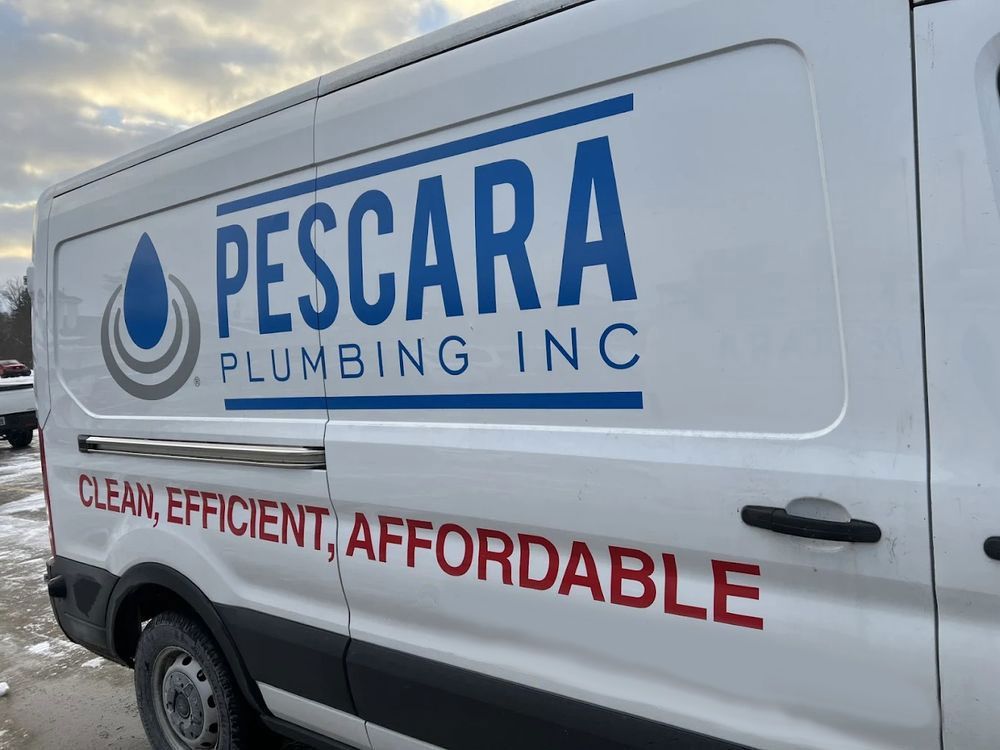 White Pescara Plumbing Inc. van with blue logo and red slogan “Clean, Efficient, Affordable”