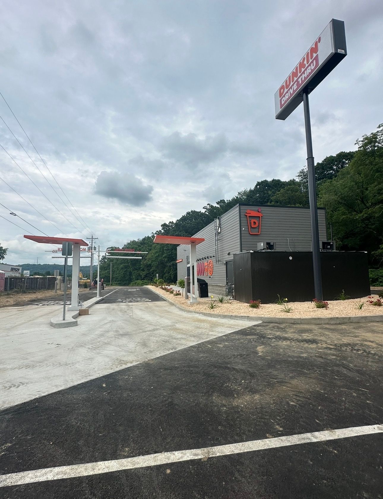A gas station with a sign that says ' emergency ' on it