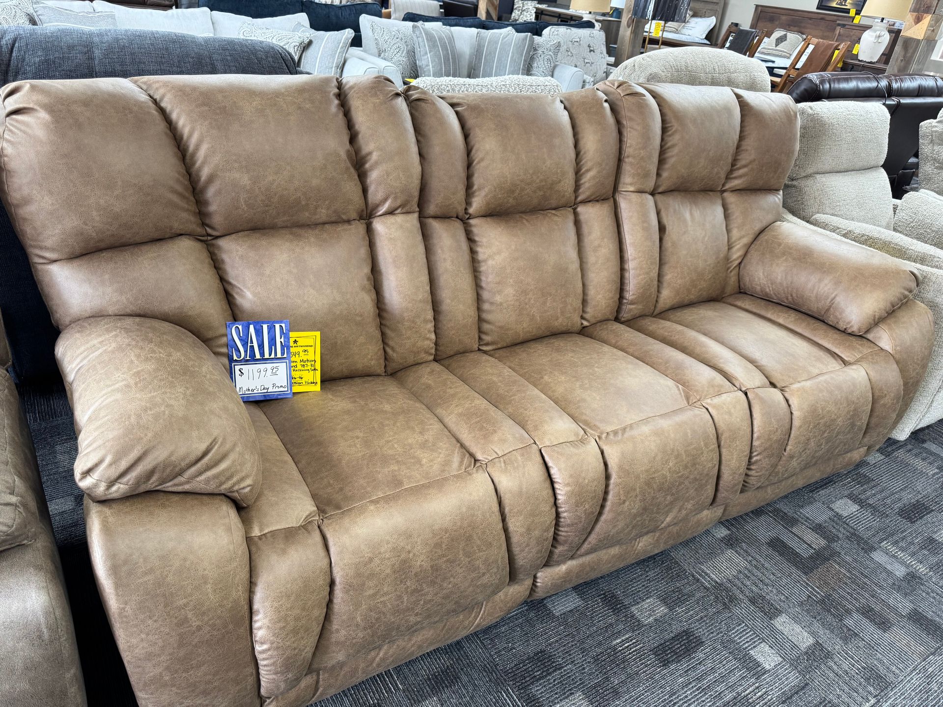 Brown leather recliner sofa with 
