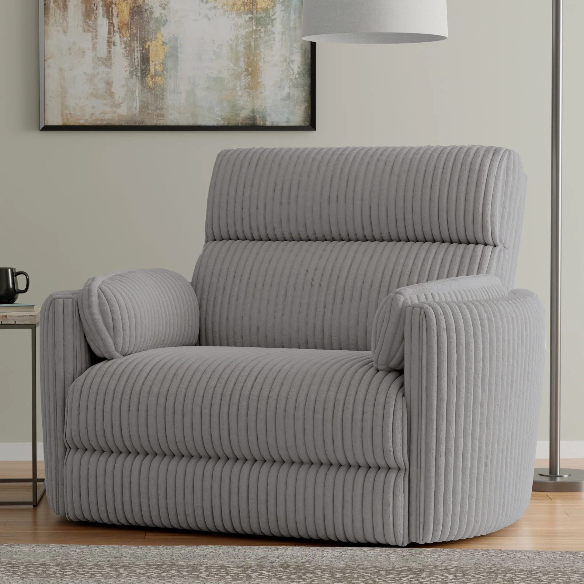 Gray corduroy recliner chair in a living room setting.