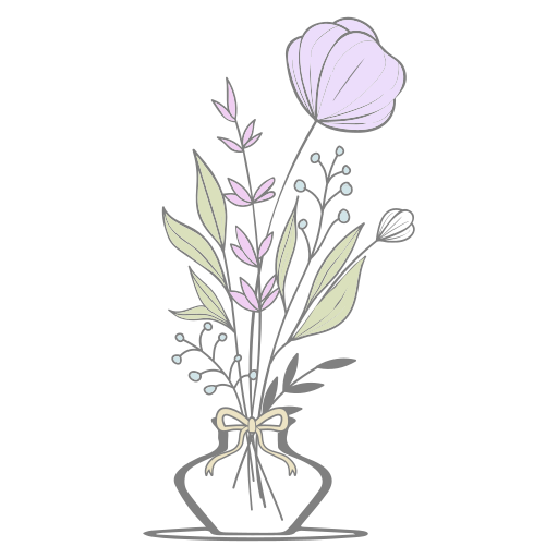 Bouquet of pastel flowers in a glass vase with a ribbon.