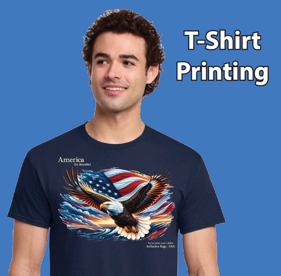 Man modeling a navy T-shirt with an eagle and American flag print, beside the text T-Shirt Printing