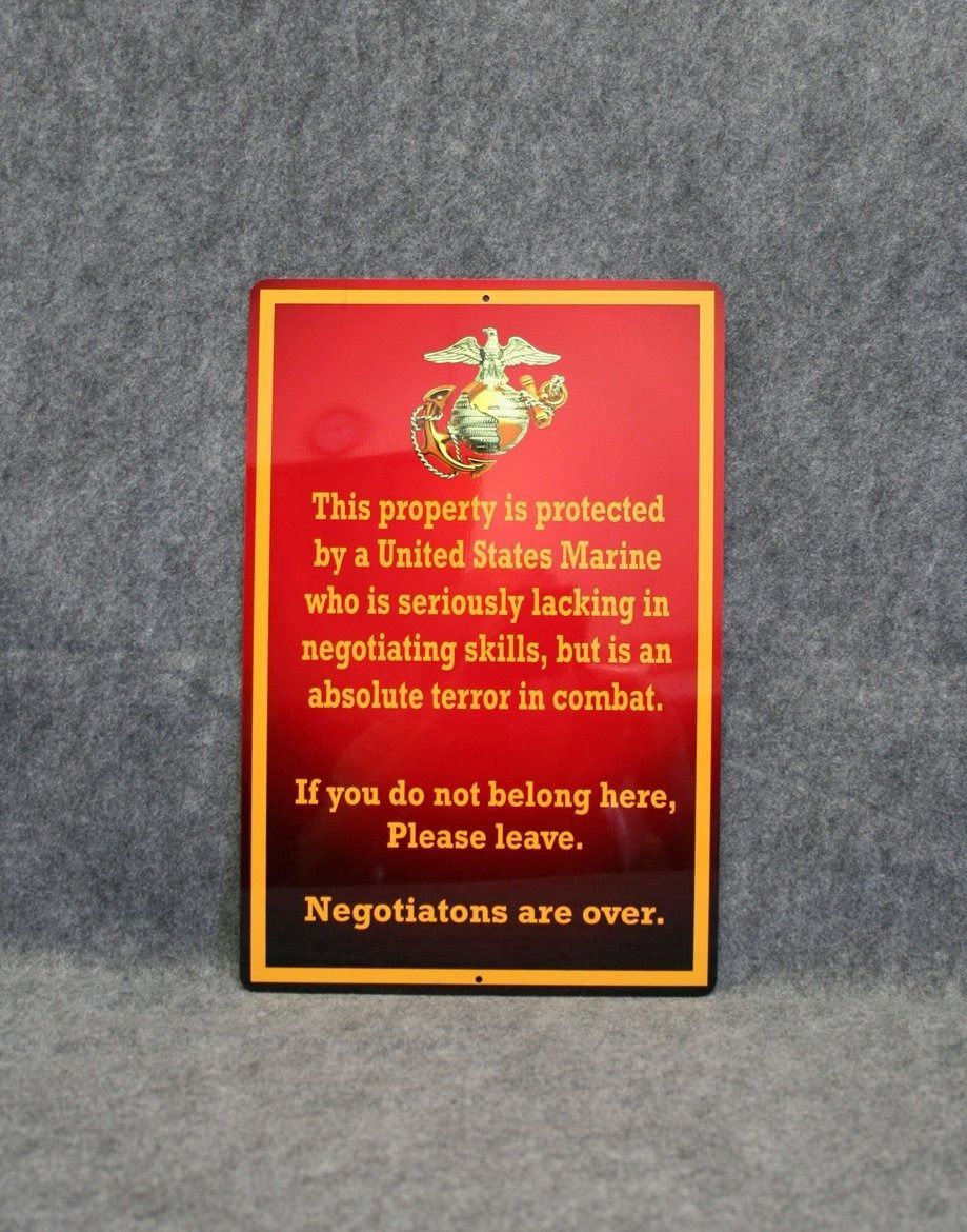 Marines sign: red background, gold text and logo, 