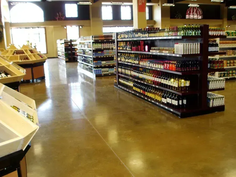 Interior of a liquor store, featuring shelves stocked with bottles of wine and other alcoholic beverages.