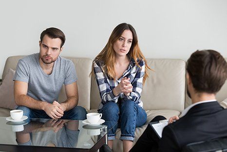Couple listening to a lawyer