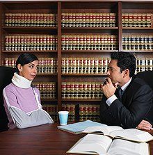 Injured person talking with a lawyer
