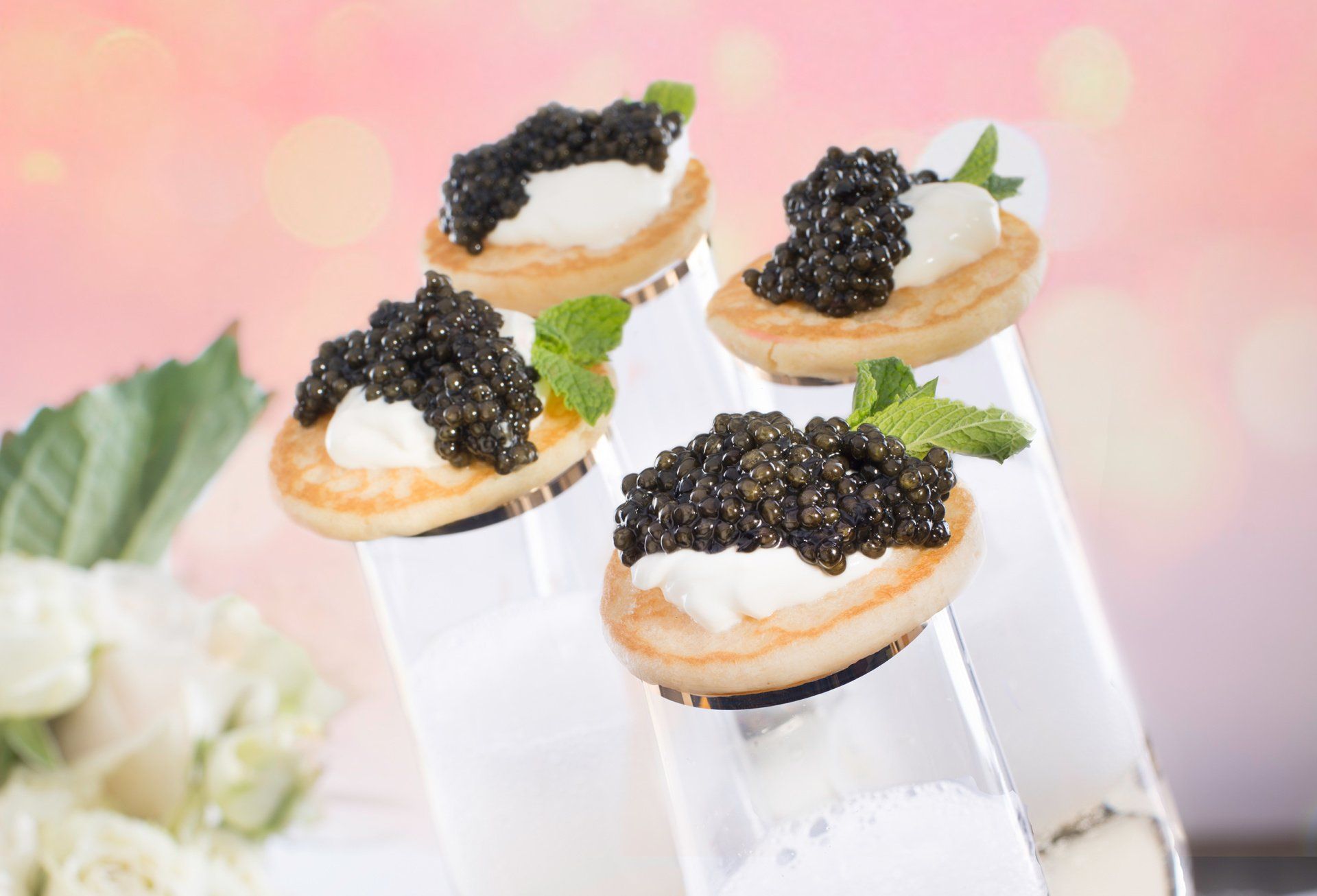 Caviar topped champagne flutes