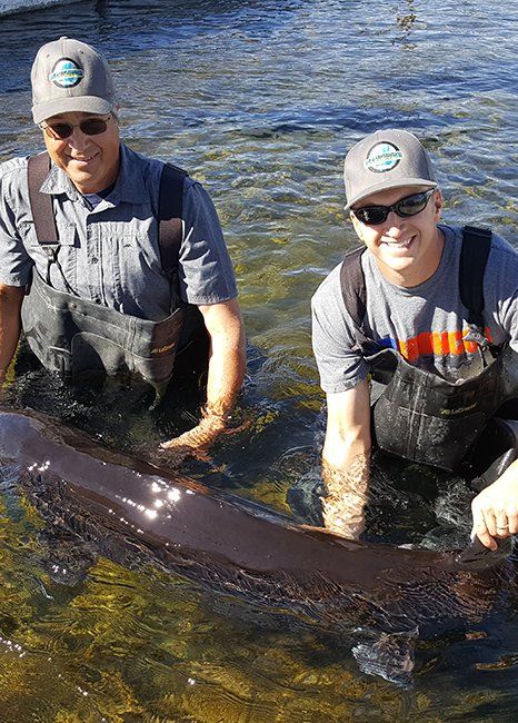 Gary and Levi with fish