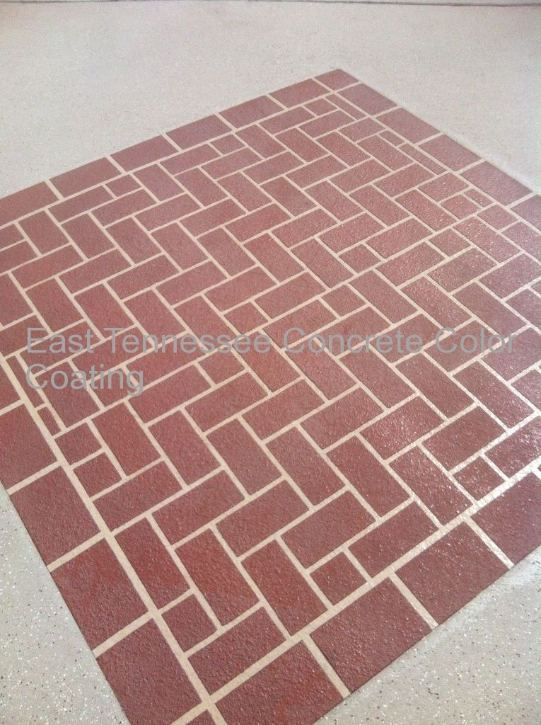 A red floor with a herringbone pattern