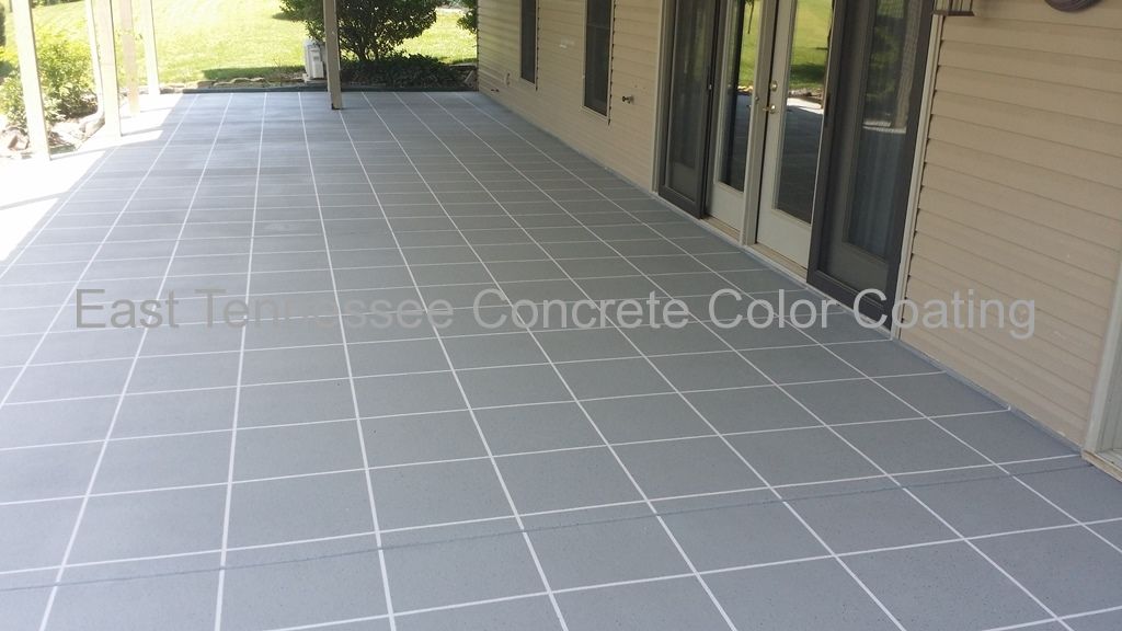 A patio with a concrete color coating on it.