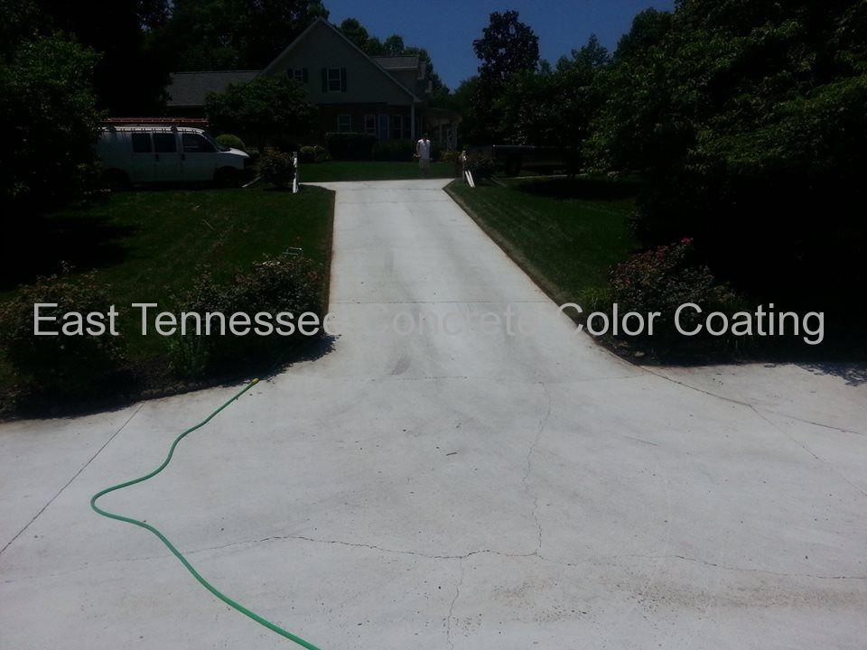 A white van is parked on the side of a driveway in east tennessee