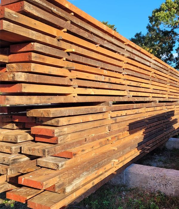 A stack of wooden boards sitting on top of each other