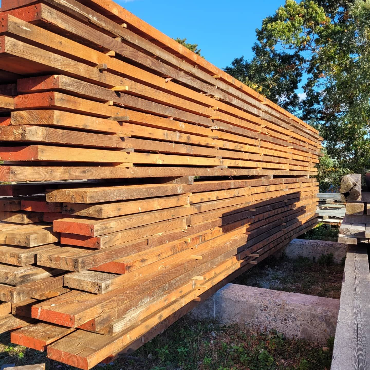 A stack of wooden boards sitting on top of each other