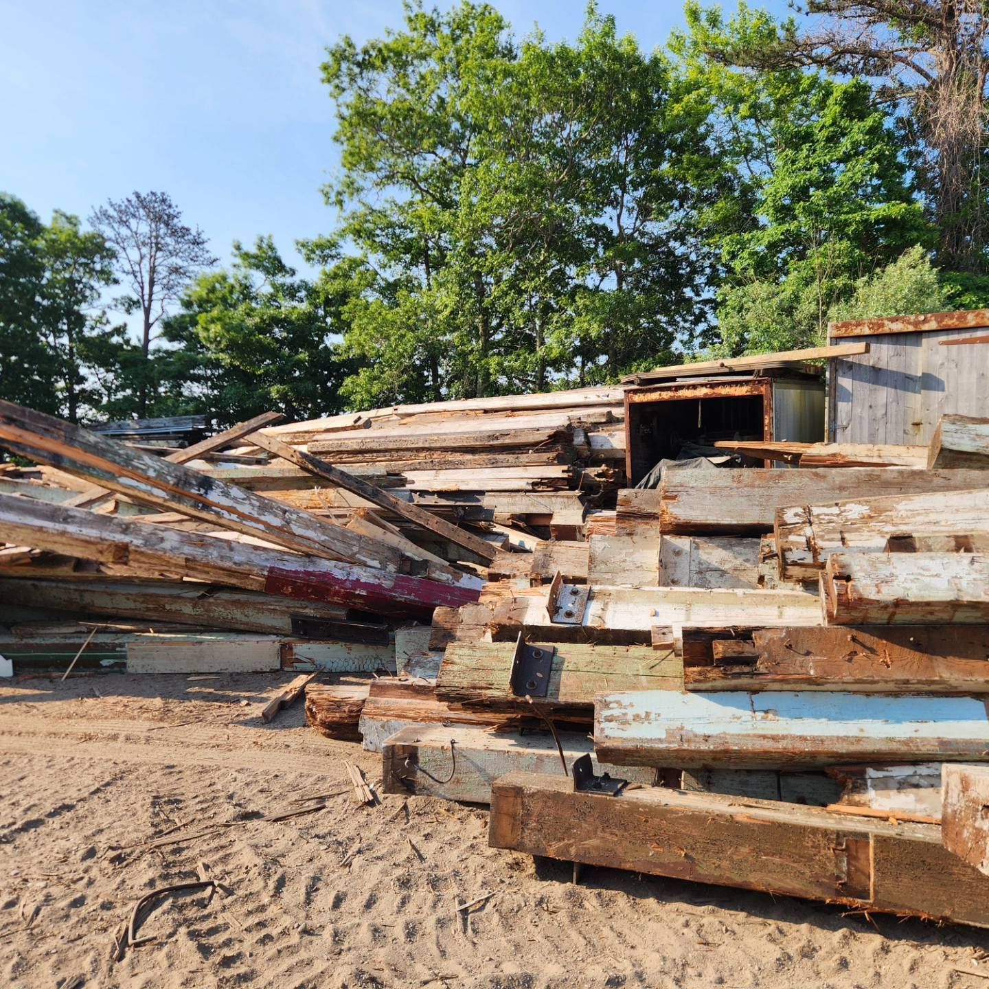 A pile of wood is stacked on top of each other