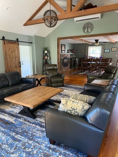 A living room filled with furniture and a coffee table.