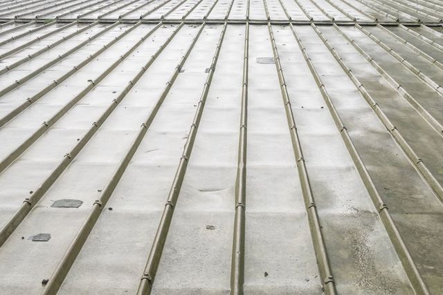 Standing seam charcoal gray steel metal roof - Metal Roofing - Metal roof, Metal  roof houses, Metal roof colors