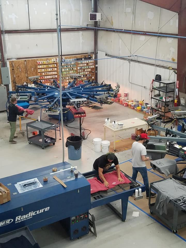 An aerial view of a factory with a machine that says hardcore on it