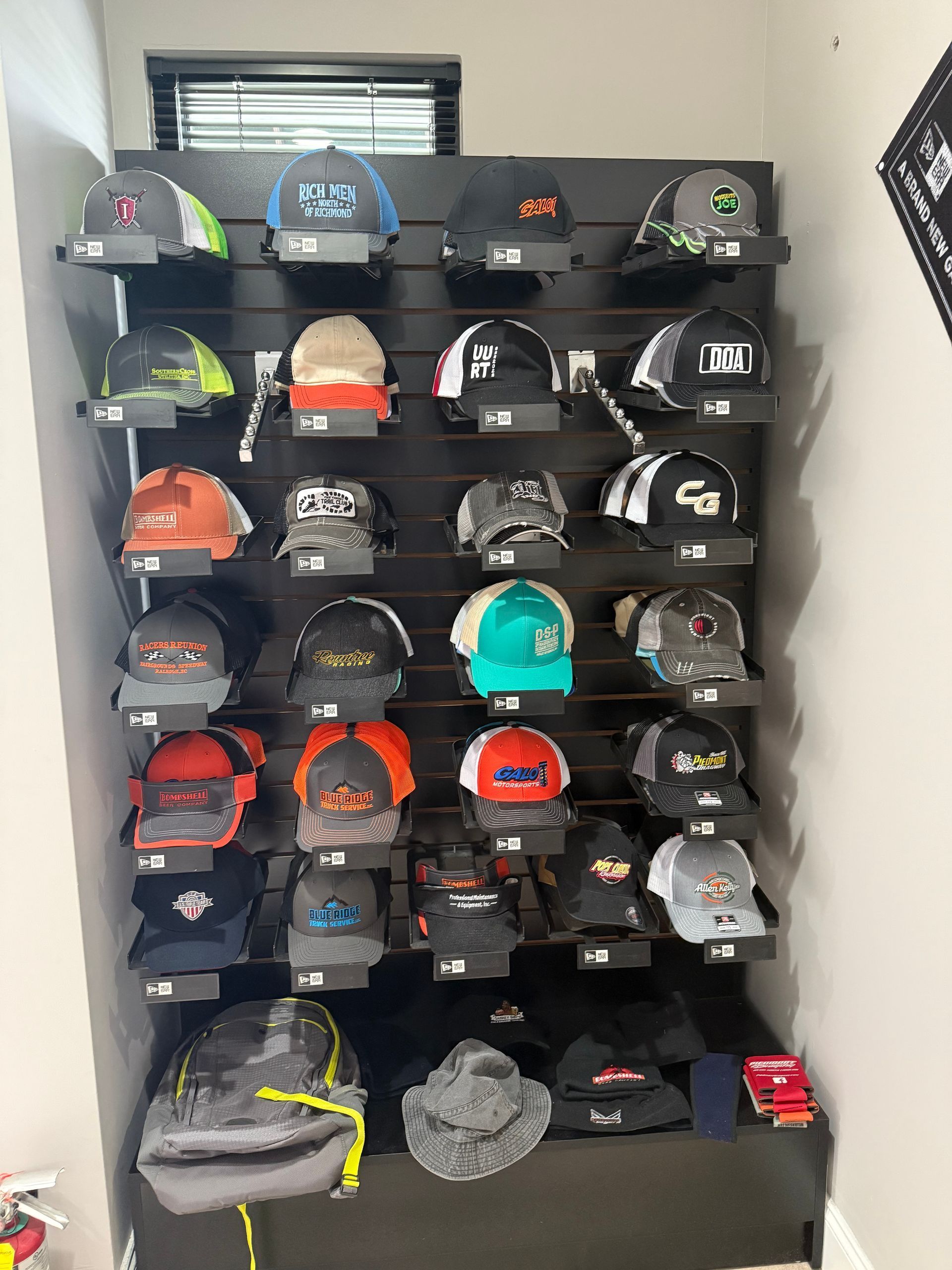 A wall filled with lots of hats.