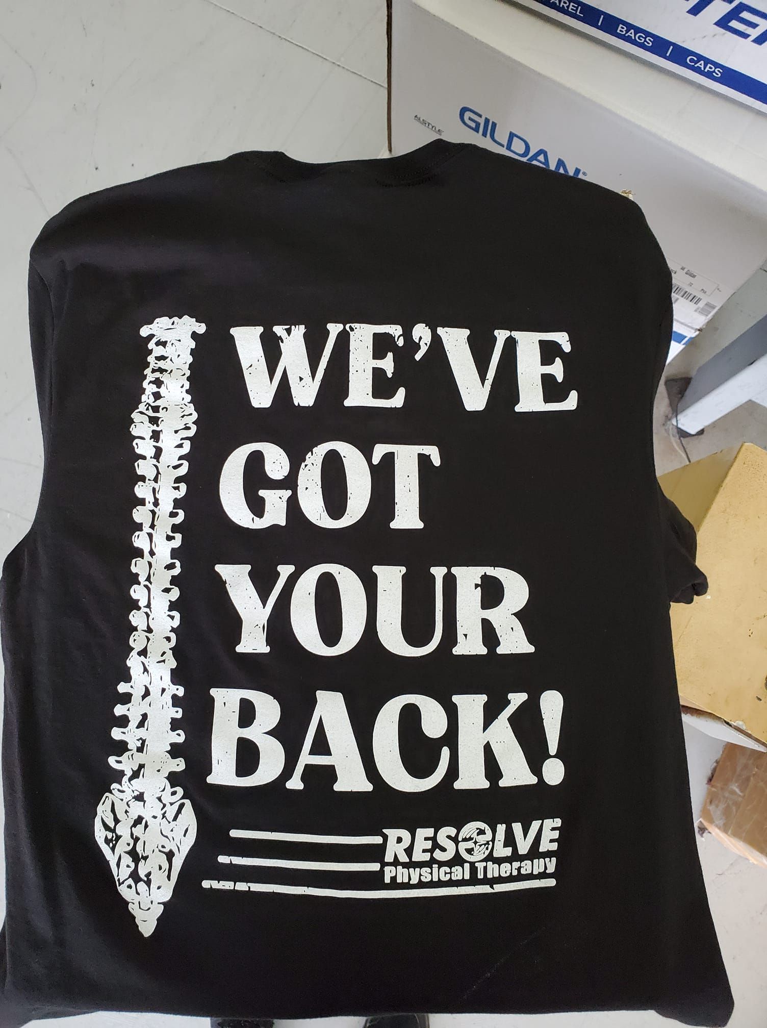 A black shirt that says we've got your back