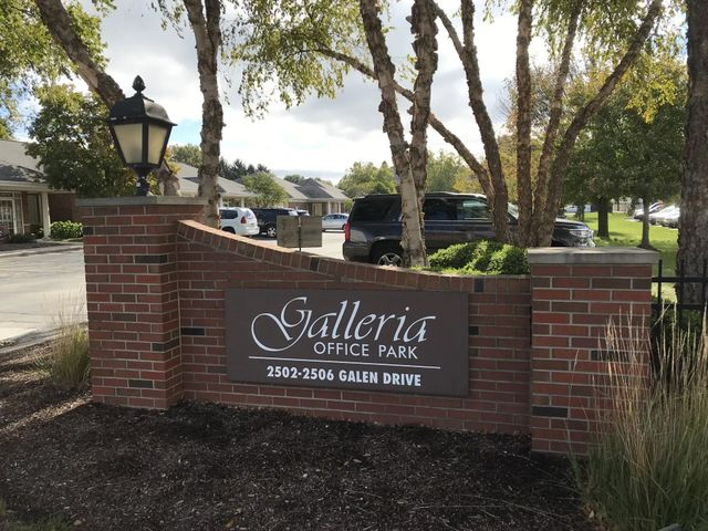 Brick entrance sign for Galleria Office Park at 2303-2306 Galen Drive.