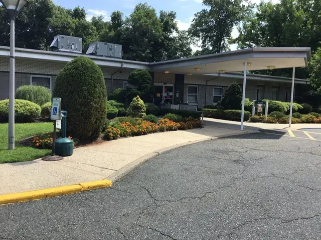A large building with a canopy over the entrance