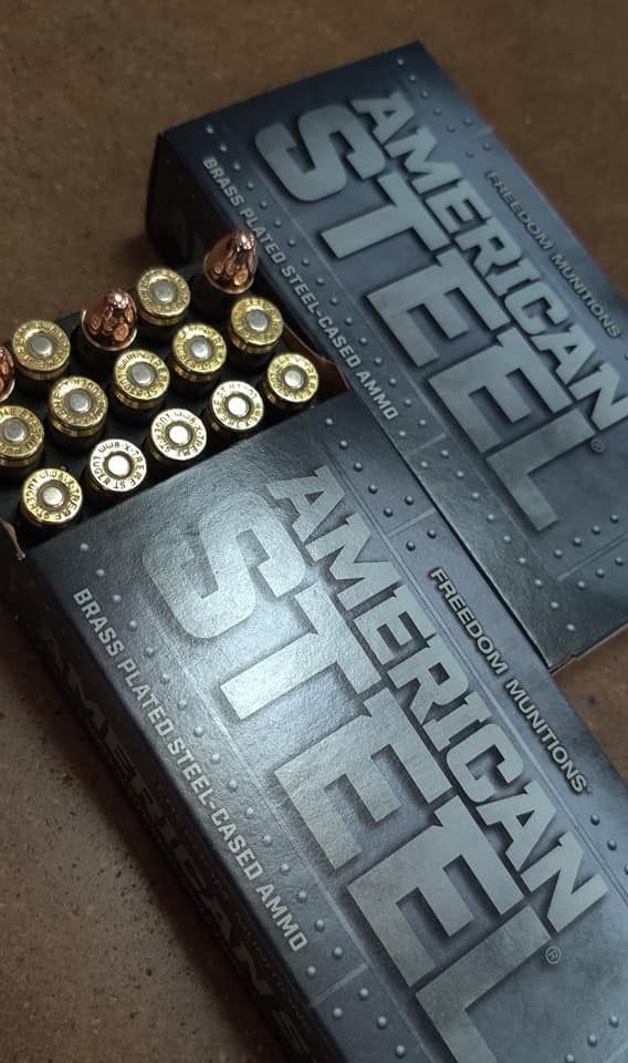Two boxes of american steel ammunition on a table