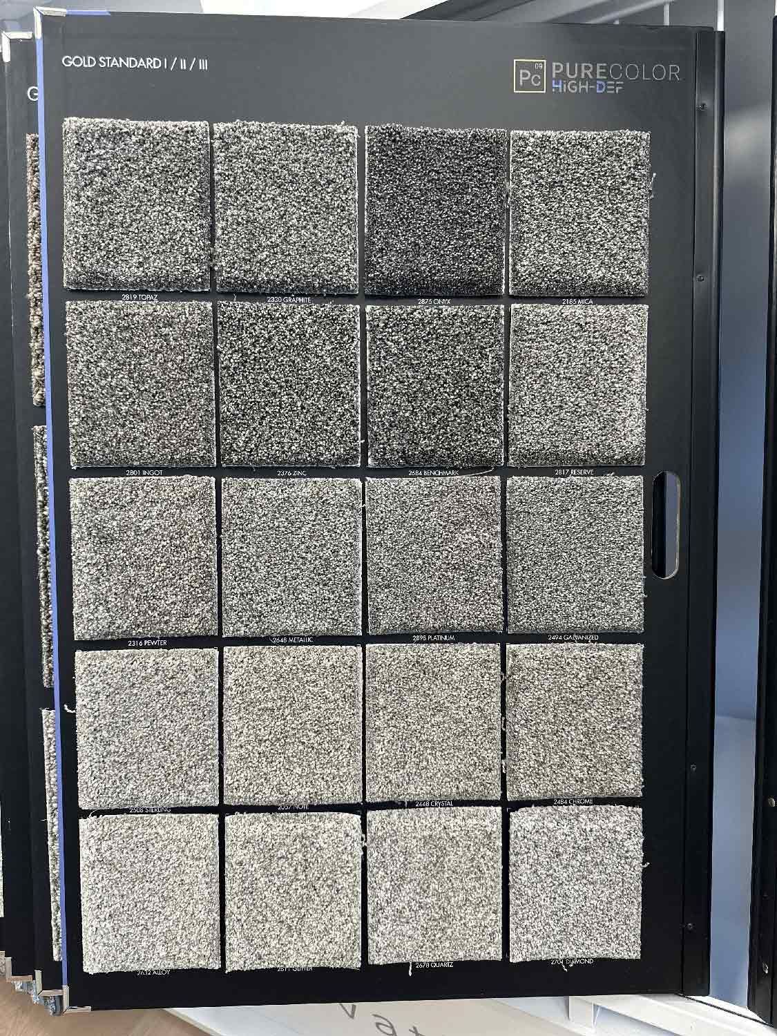 A display of a variety of tiles in a store