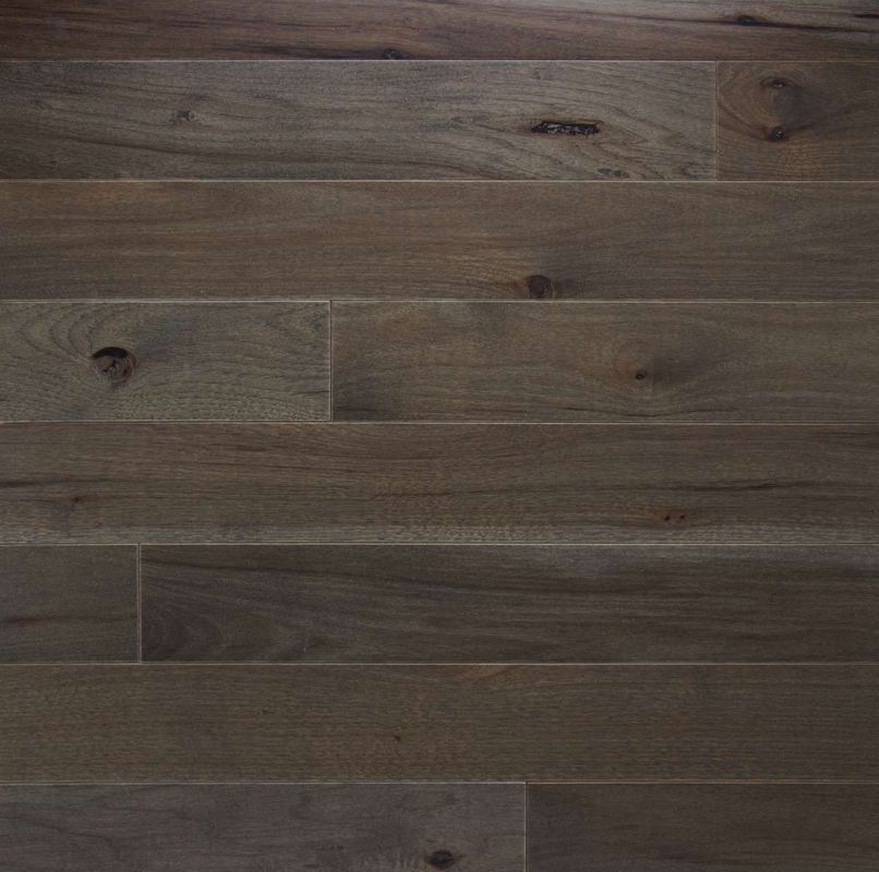 A close up of a wooden floor with a lot of grain