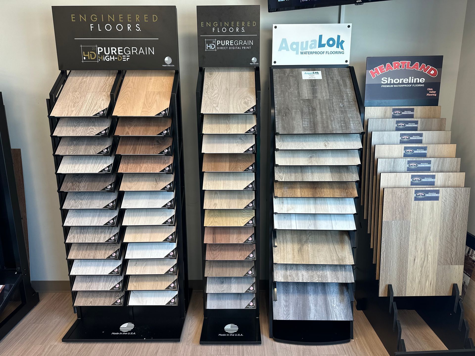 A display of different types of flooring in a store.