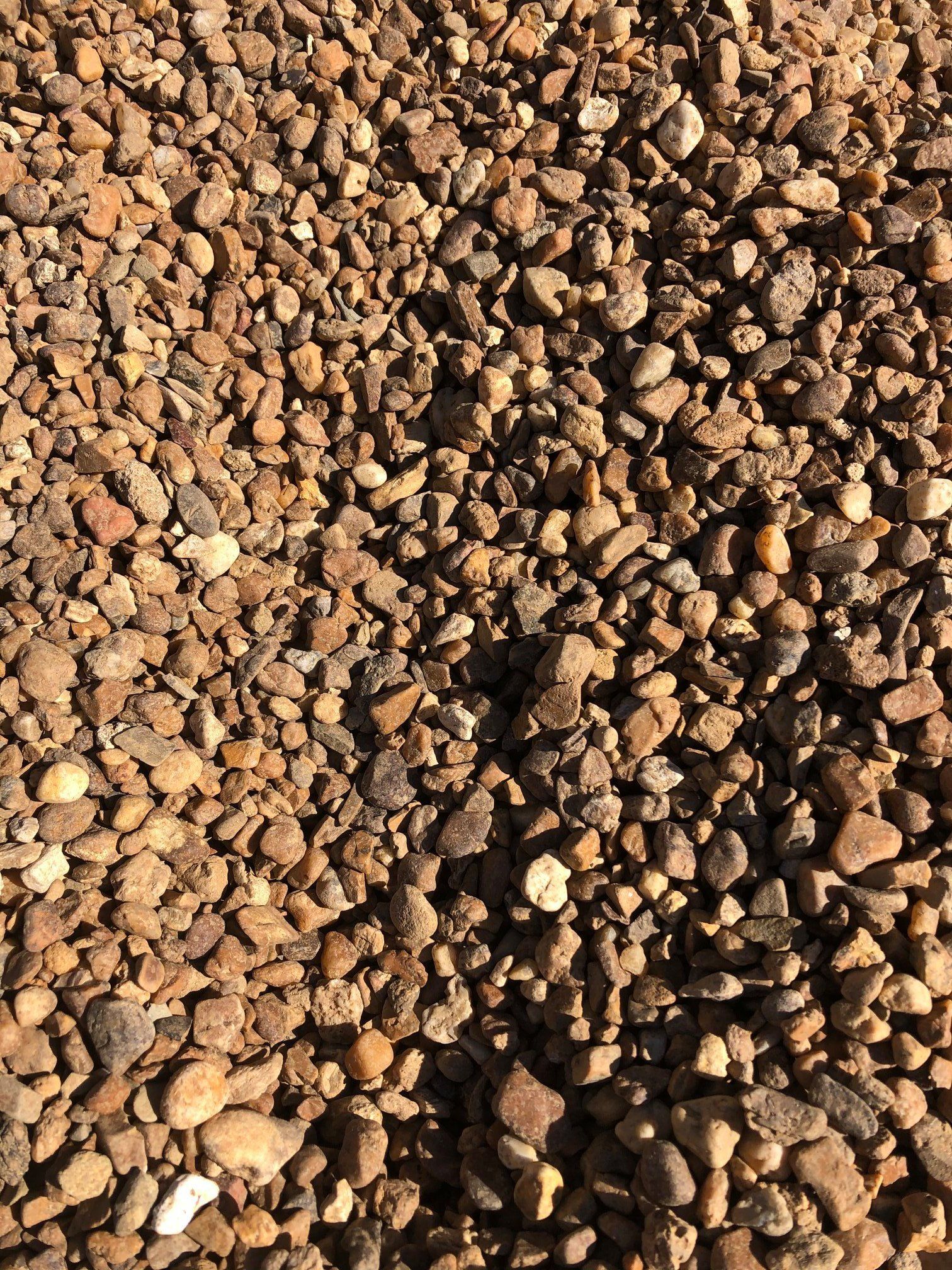 Medium River Rock $67.50 per ton