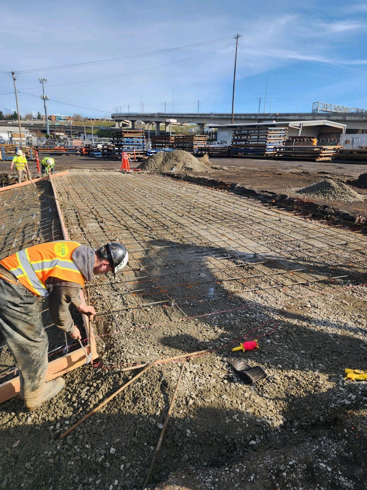 A construction worker is working on a construction site.