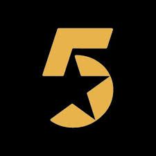 Gold number 5 with a black star inside on a black background.