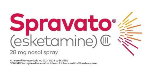 Spravato (esketamine) logo with “28 mg nasal spray” and orange-pink burst graphic