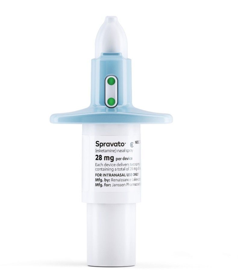 Spravato nasal spray device with white and light blue applicator on a white background
