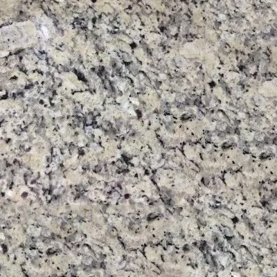Light beige granite countertop with dark speckles.