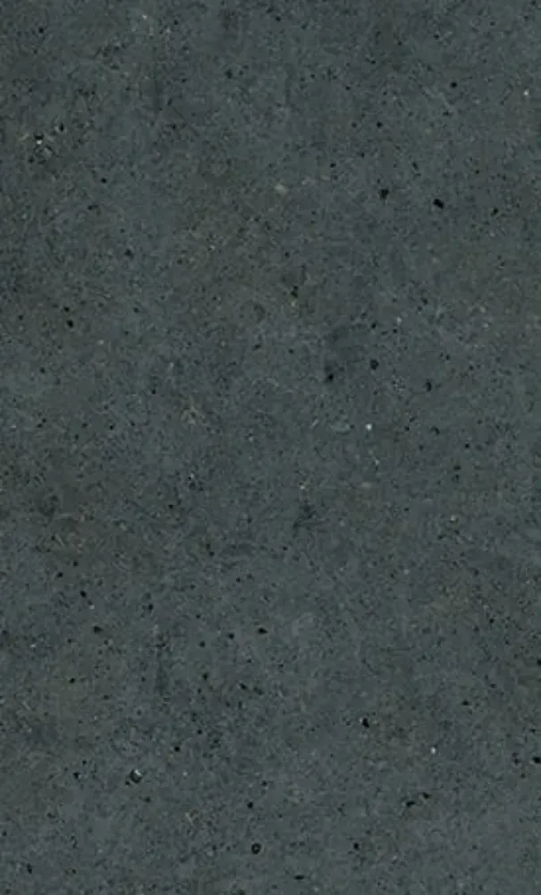 Dark gray concrete surface with small textured details.