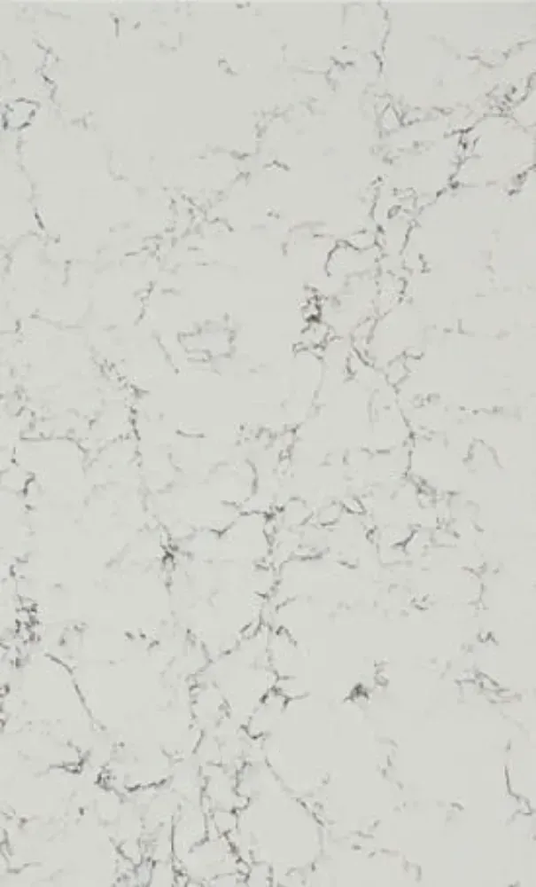White countertop with grey veining pattern.